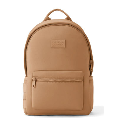 Large camel-colored Dagne Dover Dakota Backpack featuring a front zip pocket and a branded logo on the front.