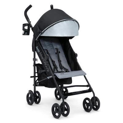 Black and grey Delta Jeep Adventureglyde stroller featuring a canopy, safety harness, and a cup holder.