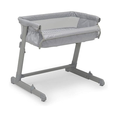 Delta Whisper Bedside Bassinet in grey stripes features a mesh sides for airflow, adjustable height, and a sturdy base for infant sleep.