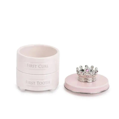 Pink keepsake box by Demdaco for baby’s first tooth and curl, featuring two containers labeled “First Curl” and “First Tooth” topped with a silver crown.