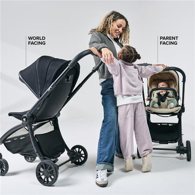 Single stroller in black with a parent-facing and world-facing option, with a mother and two children interacting.
