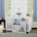Disney Mickey & Friends Mickey Mouse musical mobile features colorful rainbows, hanging Mickey figures, and a cozy crib set with friends-themed blanket.