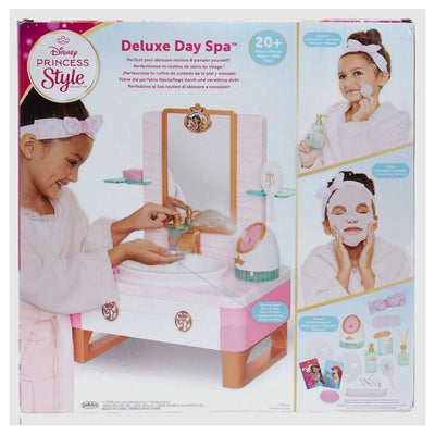 Deluxe Day Spa Style Set featuring a young girl at a vanity with a mirror, sink, and various skincare accessories.