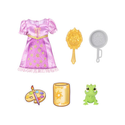 Petite Rapunzel doll in a pink dress with decorative details, includes a frog, mirror, art set, and lantern.