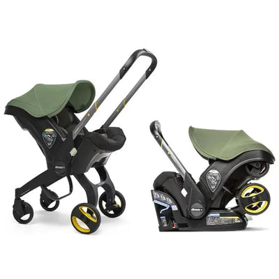Infant car seat with base and stroller in desert green, showcasing a sturdy design with a sunshade and safety features.