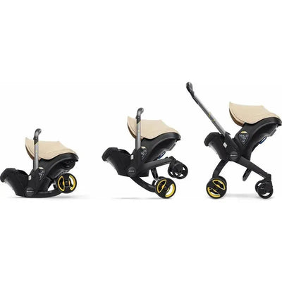 Doona+ Infant Car Seat and Stroller in Sahara Sand color shows three configurations: car seat, stroller, and a transition between both.