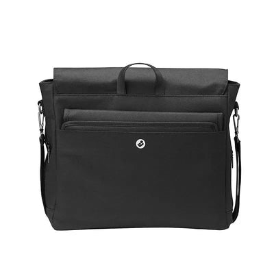 Black Maxi-Cosi diaper bag with multiple front pockets and a handle, designed for carrying baby essentials.