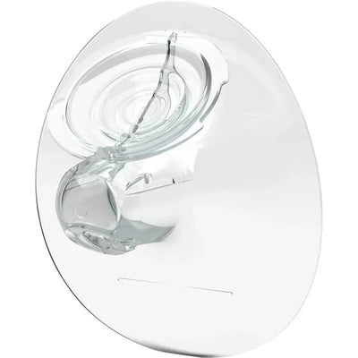 Clear Elvie breast shield, 21mm, designed for use with a breast pump, showcasing a smooth surface and ergonomic shape.