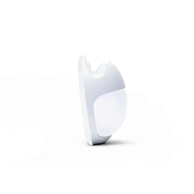 Wearable silicone breast pump in white, designed for discreet and hands-free use.