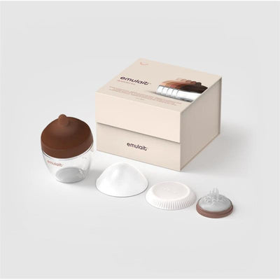 Emulait glass bottle with a brown nipple, accompanied by four interchangeable nipple shapes and a cream-colored box.