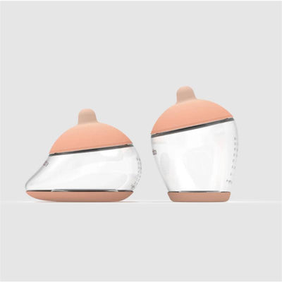 Nipple shape 2 starter kit featuring two transparent bottles with fair-colored nipples, designed for feeding.