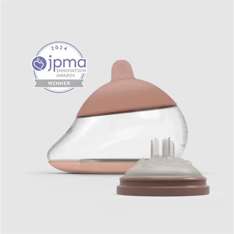 Anatomy bottle featuring a clear body and a fair-colored nipple, accompanied by a color Fair Shape 5 nipple. 2024 JPMA Innovation Award winner.