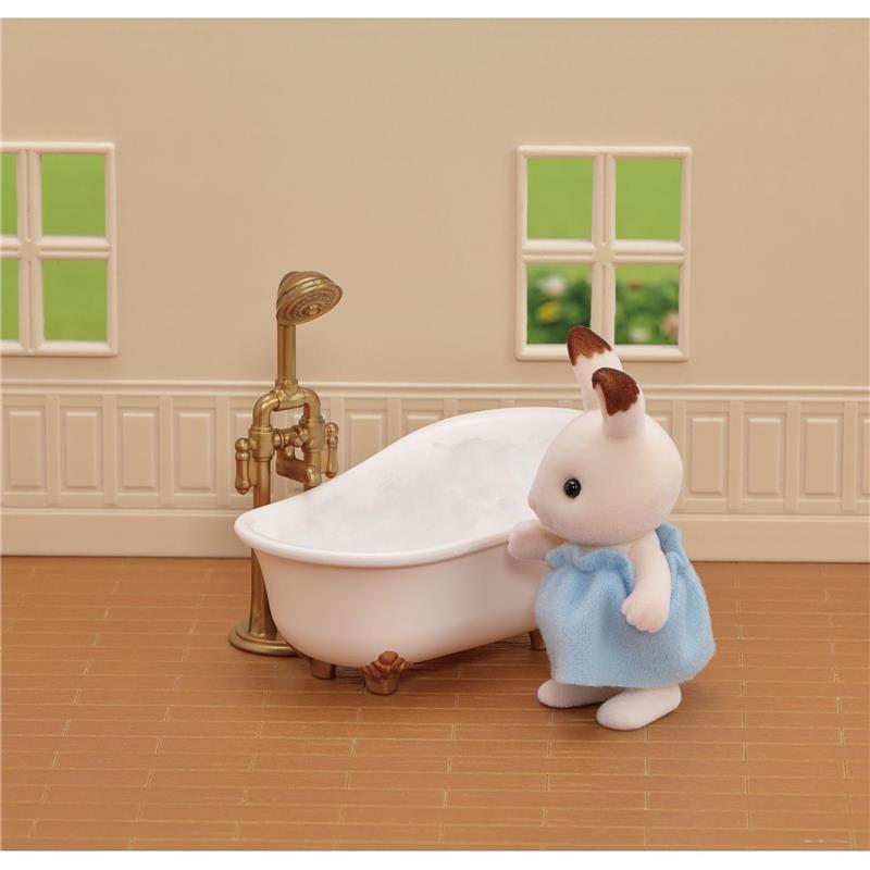 Calico Critters dollhouse scene featuring a white bunny in a blue dress by a vintage bathtub and shower.