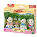 Calico Critters Sea Otter Family set featuring three otter figurines in colorful outfits, packaged with a floral background.
