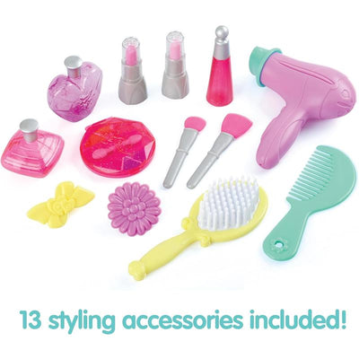 Colorful styling accessories include lipsticks, perfume bottles, a hairdryer, combs, and brushes. 13 styling accessories included!