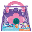 Purple toddler purse playset with a flower design, includes phone, mirror, keychain, wallet, and debit card. Recommended for ages 2+.