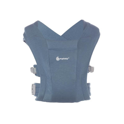 Ergobaby Embrace Newborn Baby Carrier in Oxford Blue, featuring a soft fabric and adjustable straps for comfort.
