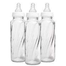 Three Evenflo Feeding 8 oz classic glass bottles with twisted design, clear glass, and soft silicone nipples on top.