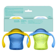 Two Evenflo Feeding 5 oz Balance Sippy Cups in blue and green with yellow lids, designed for babies 6 months and older.