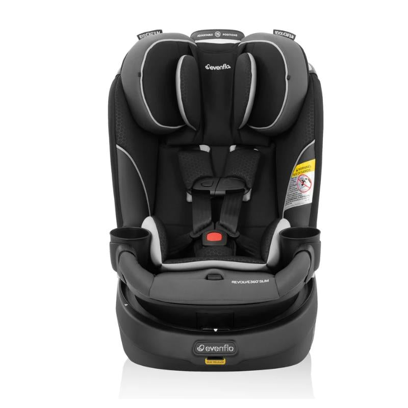 Evenflo Revolve360 Slim 2-in-1 Rotating Convertible Car Seat in Canton Black with adjustable headrest and cup holders.