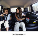 Evenflo Revolve360 Slim 2-in-1 Rotating Convertible Car Seat shown in a vehicle with two children smiling and seated.