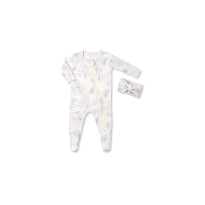 Baby girl footie in cream with light purple floral patterns, accompanied by a matching floral headband.