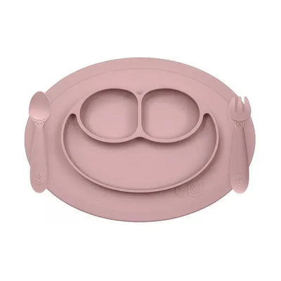 Mini feeding set in blush color featuring a divided plate with a smiley design, spoon, and fork.