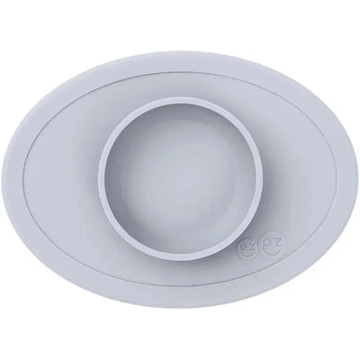 Tiny Bowl by Ezpz in pewter color, featuring a round inner bowl set within an oval base, designed for easy feeding.