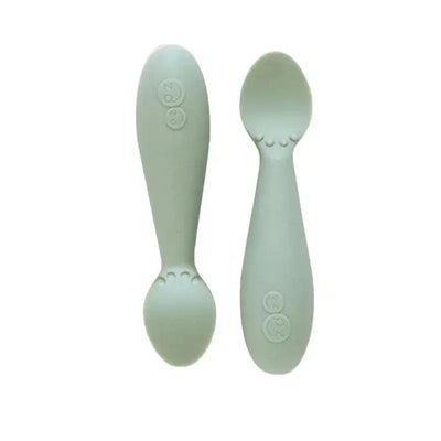Tiny Spoon Twin-Pack in sage color, featuring two soft, child-friendly spoons designed for easy grip and feeding.