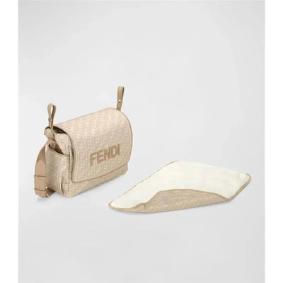 Diaper bag in beige with Fendi logo, features patterned fabric and includes a portable changing mat.