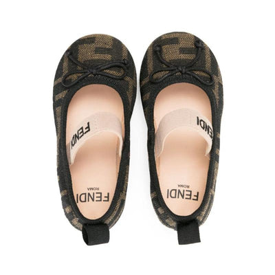 Black and brown Fendi Baby ballet shoes with bow detail, featuring an elastic strap and heel loop.