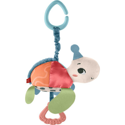 Plush turtle toy featuring colorful fabric sections, a teething ring, and a clip for attachment, designed for babies.