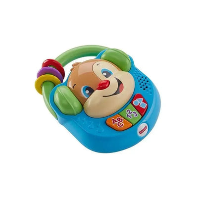 Brightly colored Fisher-Price Laugh & Learn Sing & Learn Music Player with a smiling dog face and buttons for music and learning.