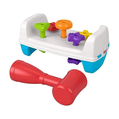 Colorful Fisher Price Tap & Turn Bench with multicolored spinning pegs and a red tapping hammer for interactive play.