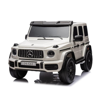 12V Mercedes G63 ride-on toy in white with black wheels and headlights, designed for children.