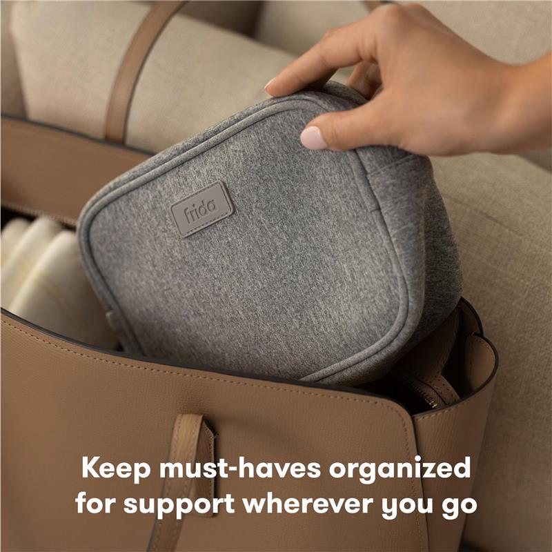 Frida Mom Breastfeeding Survival Kit in a tan bag, showcasing a gray organizer pouch with the frida logo.