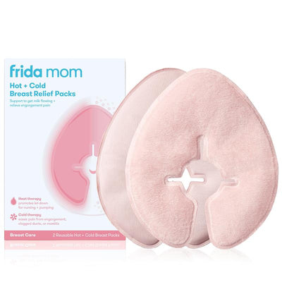 Frida Mom hot and cold breast therapy packs in pink, designed for pain relief and milk flow support, with packaging visible.