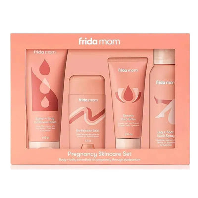 Frida Mom - 4Pk Pregnancy Skincare Body Relief Set for Stretch Marks includes four pink products: in-shower lotion, no-friction stick, stretch prep balm, and leg & foot swell spray.