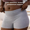 Soft, seamless, stretchy grey postpartum underwear, designed for comfort and support. Text highlights product features.