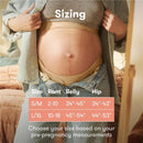 Maternity belly band displayed on a pregnant woman wearing a denim jacket, with a sizing chart showing measurements.