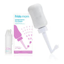 Frida Mom Upside Down Peri Bottle in gray with a travel bag, designed for postpartum care, displayed beside its packaging.