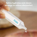 Sterile saline vial held in hand, with a drop forming at the tip; intended to hydrate and clear airways.