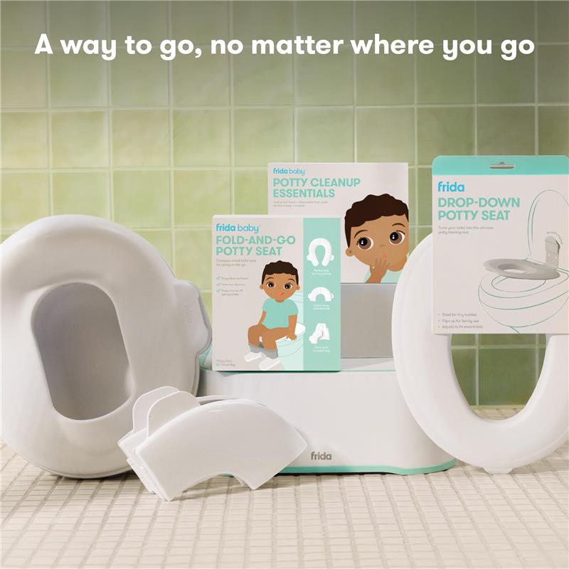 FridaBaby Drop Down Potty Training Seat for toddlers, featuring easy-to-clean design and accompanying potty training accessories.