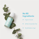 FridaBaby Eucalyptus & Lavender Essential Oil bottle beside eucalyptus leaves, highlighting its organic, sulfate-free formula.