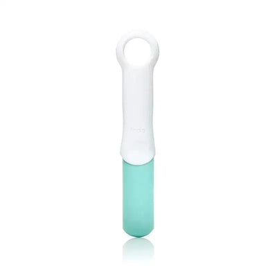 Fridababy Easy Grip Nail Scissors with a white handle and turquoise blade designed for safe nail trimming.