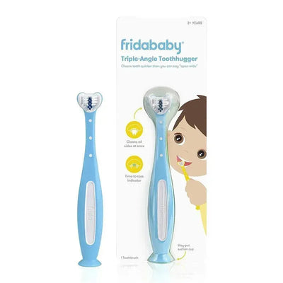 Fridababy Smilefrida 2.0 Toothhugger in blue, designed to clean teeth quickly with a triple-angle brush head and suction cup base.