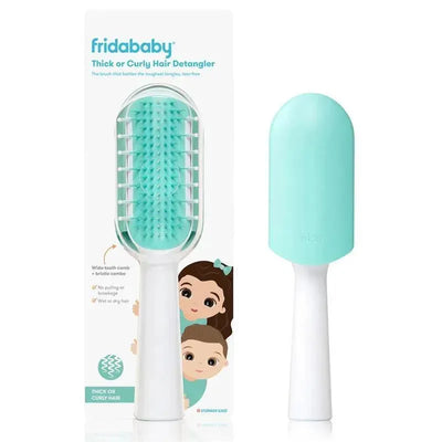 Fridababy detangling hair brush for kids, featuring a wide-tooth comb and bristle combo, designed for thick or curly hair.