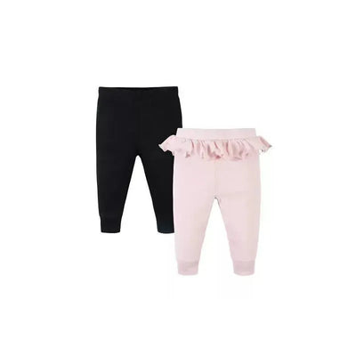 Black and pink baby pants set featuring a ruffled waistband on the pink pair, designed for girls.
