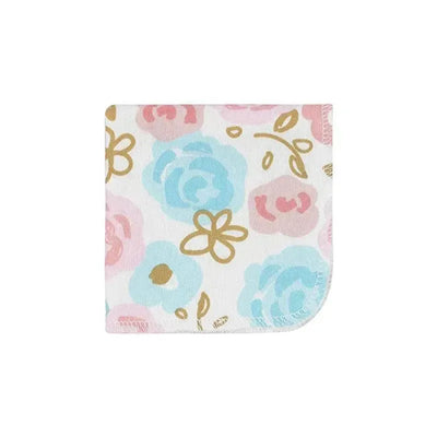 Terry washcloth in princess pink, featuring a floral pattern with blue, pink, and gold accents.