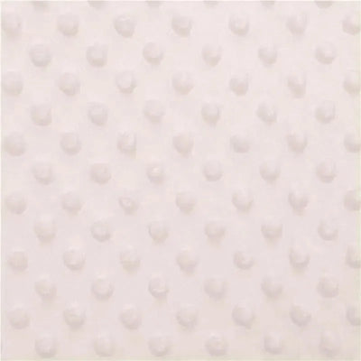 Beige changing pad cover with a textured, dotted pattern, designed for baby bedding.